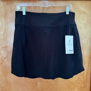 New with tags, Athleta Run With It Skort, black size large